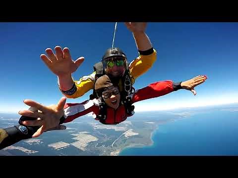 Fist Bumps 15,000 ft Above Lake Taupo | Taupo Tandem Skydiving