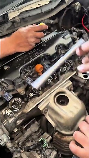 Quick & Safe Way to Remove Car Spark Plugs! 🚗🔧✨ #shorts #carrepair #mechanic #diy #sparkplugs #honda