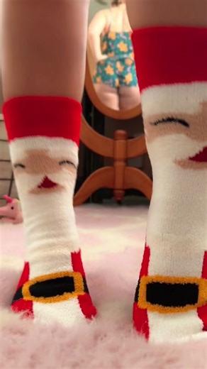 Do you like my Santa socks? #ChristmasEve #SantaIsComingToTown #FuzzySocks ##Cozy#S#SantaClausS#SockTokS#SockOclock