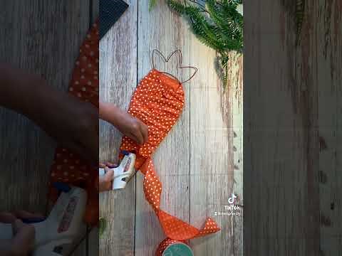 Make this Easy carrot wreath for Easter or spring using a Dollar Tree carrot frame!