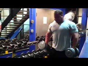 Derek Poundstone curling 80lb DB