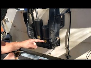 Outboard boat motor tilt & trim problems fixed by filling with fluid and bleeding the system