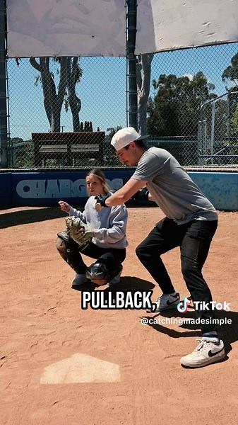How Far Back Should a Catcher Stand? Navigating the distance between you and the batter is crucial for every catcher💯 Stand too far back, and you risk the ball bouncing before it reaches you👎🏼 Too close, and you might end up with a bat in your glove or a backswing to the head🤕 📍 The Ideal Position: Aim to be a little more than an arm's length away from the batter, giving you a bit of extra cushion 🙌🏼 #baseball #softball #catcher