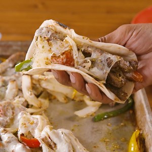 This is the easiest way to serve fajitas to a hungry crowd. Full recipe: http://dlsh.it/KTvkbFa | Delish