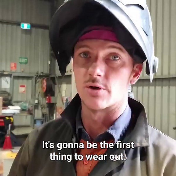 Fitting a new blade skin on a compactor