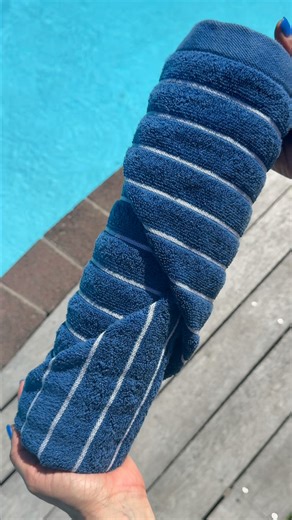 BEACH TOWEL ROLL HACK Hotel vibes at home 🏝️ Here’s how to roll your beach towel like a resort pro — easy, stylish, and space-saving. | Briscoes