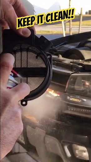 CLEANING MASS AIR FLOW SENSOR WITH CRC MAF SENSOR CLEANER.