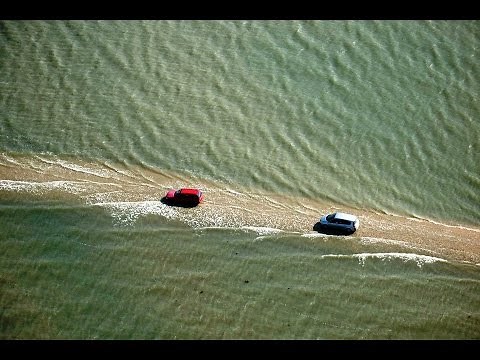 This road gets flooded & disappeared twice daily in France