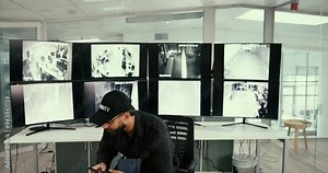 Security guard, safety and team with people in control room for surveillance system, evacuation protocol and monitor observation. Inspection, technology and shift rotation with man and woman transfer