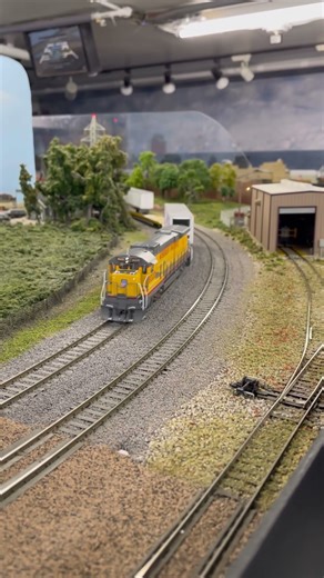 Passing field and over rural grade crossing #train