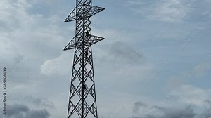 Power line support, insulators and wires. Appearance of a design. Assembly and installation of new support and wires of a power line.