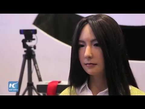 Beautiful lifelike robot girl at World Robot Conference, Beijing