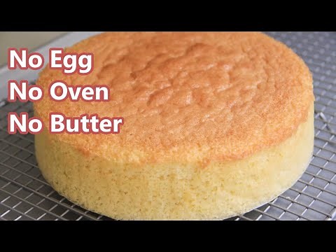 BASIC EGGLESS VANILLA CAKE VIDEO | HOW TO MAKE NO OVEN SPONGE CAKE | without condensed milk
