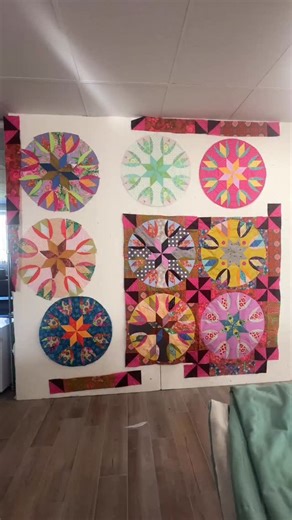 This was my cottage tulip quilt that I started at Woodland Ridge retreat just using up my ‘leftover cut parts’ from my “parts department of extra pieces” that I had and just was making crazy blocks to use up the parts. I loved it so much I’ve made it into a lap quilt. Next I thought well, probably have a few more sample cottage tulip blocks at home ~and I did. Soooo, I could make easily make this quilt larger by only making two more blocks…and so now I am back to making it a BIG bed Quilt.. that