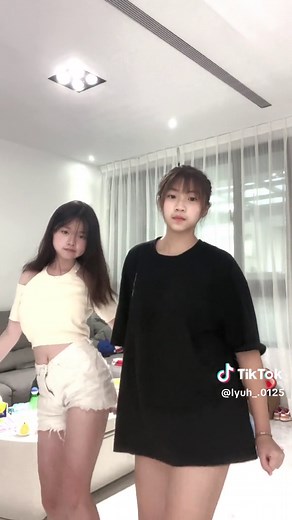 Synchronized Dance Routine in Modern Living Room