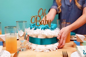 You'll want to save this for the next time you have a Baby Shower to attend. 🍼 We're showing you how to create a DIY diaper cake: a baby shower gift that doubles as décor. See full steps: http://bit.ly/2su0sOC #Sponsored | Evite