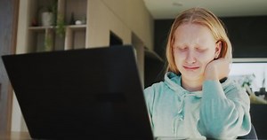 The child is crying at the laptop monitor. Problems in study or communication concept