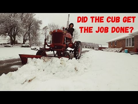 Spinning to Win- Farmall Cub Plowing Snow!!