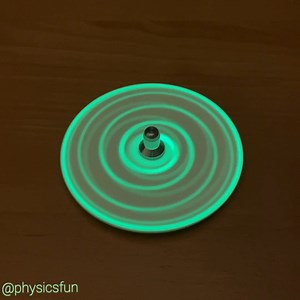 The PhoTOP https://www.physicsfunshop.com/search?keywords=photop Phosphorescent glow illuminates the intricate path of a 405nm laser pointer beam on a balanced spinning disk. Let the disk set alone for a few minutes to allow the traces to fade- and repeat again and again to experiment making new patterns. Another piece of mesmerizing interactive kinetic art from the mind of Prof. Ken Brecher. ➡️ Follow the link above for info on where to get a PhoTOP and many other amazing items featured here on