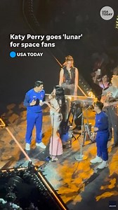 Katy Perry went "extra-terrestrial" when she spotted two fans at her Mexico concert wearing blue jumpsuits similar to the Blue Origin suit she wore during her spaceflight. | USA TODAY Life