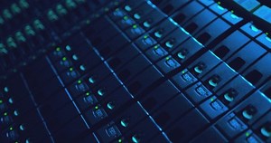 Close-up view of modern internet network switch with plugged ethernet cables. Blinking green lights on internet server. Optical server. Commutator. Flashing lights. Optical fiber. Video IP Gateways.