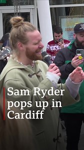 85K views · 1K reactions | Sam Ryder wowed fans with a surprise "gig", busking in Cardiff Bay on Saturday  The Eurovision star is visiting different parts of the UK to promote his new album Despite the cold, he said the crowd's "hearts were warm and in good spirits" https://bbc.in/3UAm7w5 | BBC Wales News | Facebook