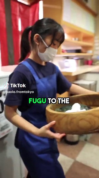 Japanese Chef Cutting Fugu Sashimi: A Skilled Display
