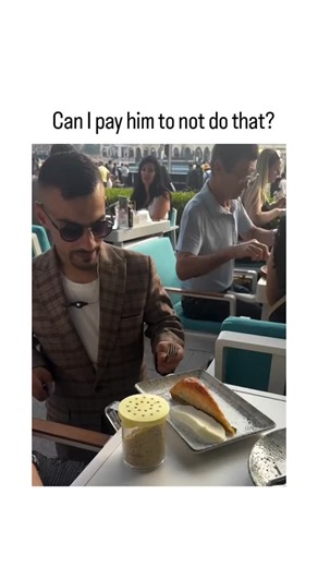 @joy_trend_01 on Instagram: "The video captures a sharply dressed man meticulously dissecting kunefe—a syrupy, cheese-filled Turkish pastry—with knife and fork at a Dubai waterfront cafe, prompting the caption's exasperated plea to stop the overly formal display. Posted by @HumansNoContext , a popular account curating bizarre human moments, the clip exploded to over 330,000 views in hours, sparking 165 replies mocking the performative eating as peak pretension. Cultural irony lies in kunefe's tr