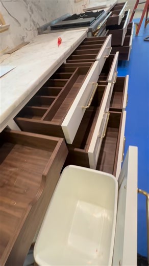 7.1K views · 2.6K reactions | White cabinets, walnut drawers. Name a better combo. I’ll wait. • No premade Rev A Shelf inserts here. These are custom made in the shop with your input to make sure your custom kitchen shines and functions the way it should. • Interior Design @pwdstudio Cabinets and Installation: @jchcabinets • #cabinetry #interiordesign #customcabinets #charleston #jchabinets | JCH Cabinets and Installations | Facebook