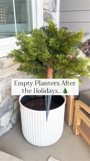 Kati Nairn | Beyond Gray on Instagram: "Comment CEDAR FILLER for the link! This is my go-to solution when the holiday decor comes down and my porch feels empty. These faux cedar container fillers look realistic and they’re evergreen so they can technically stay out all year long without ever looking out of season. ✨ We sold these out when I first shared them last winter so I wouldn’t dilly dally!"