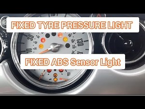 How do you reset the tire anomaly warning light in the Mini Cooper convertible?