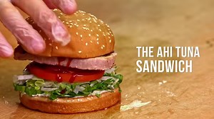 2.8K views · 46 reactions | Catch of the Day = Ahi Tuna Sandwich! This line-caught fresh favorite is lightly seasoned, spritzed with fresh lemon juice, seared to perfection over an open flame, then topped with tangy Teriyaki drizzle. Fresh flavor is only a click away on The Habit Mobile App. | Habit Burger & Grill | Facebook