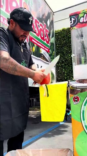 The fastest you'll ever see a watermelon cut!