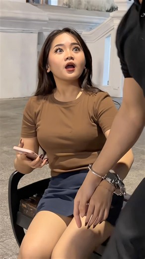 Handcuff prank pretty girl