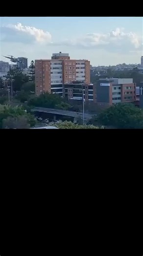 @crazy_trends08 on Instagram: "This instagram post shares a 21-second video of a Royal Australian Air Force C-17 Globemaster transport plane executing a low-level flyby between Brisbane's skyscrapers, captured during the Riverfire Festival rehearsal on September 4, 2025, with audio of surprised onlookers in Spanish. Posted December 14, 2025, by @CensoredTube —a account focused on viral, mildly censored clips—it quickly garnered 1.7 million views and 7,500 likes, prompting replies speculating on