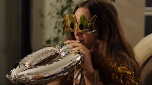 Girl blowing up a balloon  - Free Stock Video Footage | Coverr