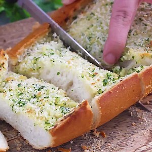130K views · 35 reactions | This homemade BEST Garlic Bread will be the BEST you'll ever have! <3 lots fresh herbs + roasted garlic. Bake it up for game day and serve with marinara for dipping! FULL PRINTABLE RECIPE: https://www.ambitiouskitchen.com/2018/01/the-best-garlic-bread-recipe/ | Ambitious Kitchen | Facebook