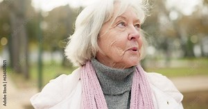Senior woman, thinking in park and happy outdoor walk for wellness in retirement and freedom in woods, forest or nature, Face, elderly person and breathing in morning air in with trees in the garden