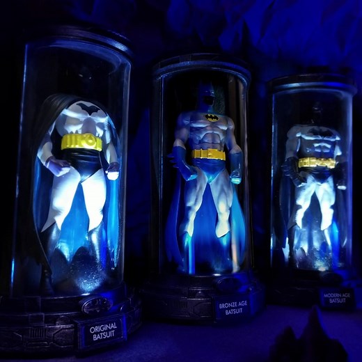 Create a timeline of legendary Batsuits with this detailed BATMAN sculpture collection. Shop Now! | The Bradford Exchange