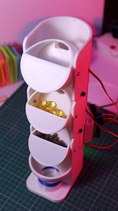 After finding out how expensive automatic pill dispensers are, I made my own. Links in comments