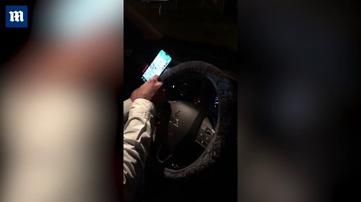 Man caught with a mobile phone attached to his steering wheel