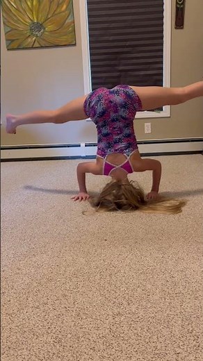Headstand splits gymnastics contortionist