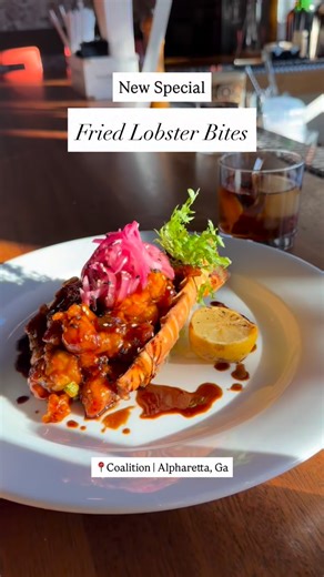 New special just swam in 🦞✨ Our fried lobster bites feature a 9oz lobster tail, cut into pieces and tossed in spicy Szechuan sauce, finished with pickled red onion and sesame seeds for the perfect bite. 📍 Coalition Steak & Seafood, 50 Canton Street, Suite 108, Alpharetta, GA #SeafoodLovers #FreshSeafood #AlpharettaEats #FoodieFavorites #LuxuryDining | Coalition Food and Beverage