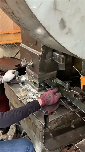 Cutting Iron Plates Using Press Machines To Create Neat And Precise Parts For Industrial Manufacture