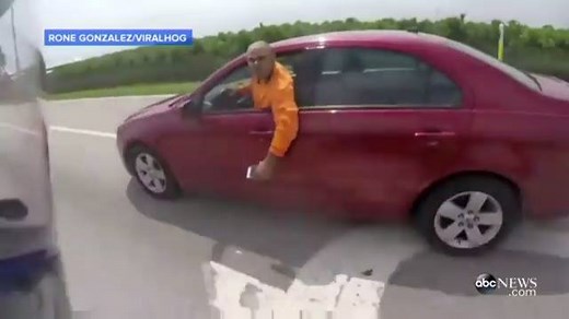 WATCH: A wild high-speed altercation between a motorcyclist and a car driver. Both drivers face charges over this very dangerous road rage incident. http://abcn.ws/1PUJUhd | Good Morning America