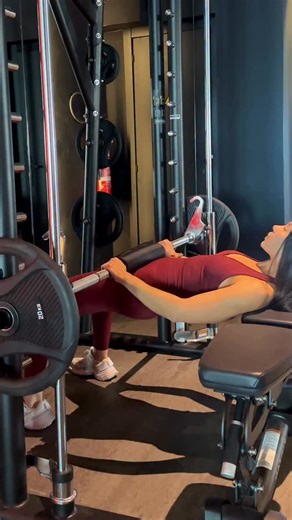 Olha Maievska on Instagram: "Hip Thrust in Smith Machine — step-by-step setup To get maximum glute activation, your setup matters. Step 1. Bench distance Place the bench about shoulder-width away from the bar. Step 2. Bar position Sit down and slide your hips under the bar. The bar should rest on your hip bones. Step 3. Feet position Place your heels under your knees. Feet stay stable throughout the movement. Step 4. Upper body Position the bench under your shoulder blades. Keep your chest open 