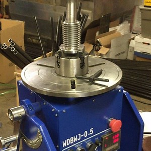 Rotary weld table is tooled up now. Just need mount welding gun and wire in welder controls. Should be done just in time for machined parts coming from shop this week. Yes the next batch of ShouldeRoks will have the handles machined by yours truly as well as the welding. #welding #machining #kabukistrong #madscientist #shoulder #ShouldeRök #shoulderok | Chris Duffin