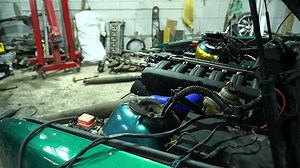 a mechanic builds and installs a cold air intake system on a drift car with a turbo engine