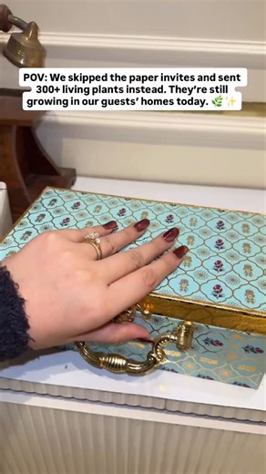 Rishabh & Akansha on Instagram: "Most wedding cards end up in a drawer (or the trash) 24 hours later. We wanted our celebration to live a little longer. Instead of paper, we gifted 300+ living plants. Every plant had a small QR code—one scan took our guests to our digital invite with all the details. No paper waste, no single-use plastic, just a new life to nurture. But the best part? Our family stayed back to teach every guest how to care for their new green friend. From elderly relatives proud