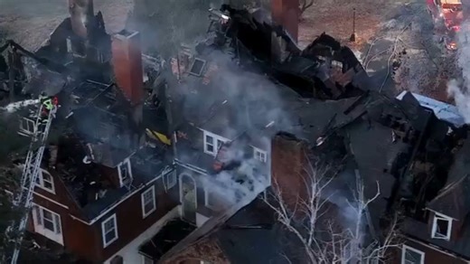 WBZ drone video shows the roof collapse at the historic Oakhurst Manor in Northbridge after an overnight fire. | WBZ / CBS News Boston
